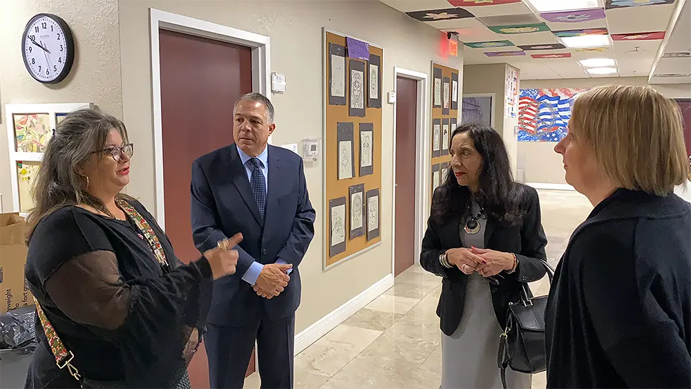 Senator Raptakis and his wife at Plato Academy Clearwater discussing about the vision of the school with the Chief of Staff Deveopment, Mrs. Dawn Parker.